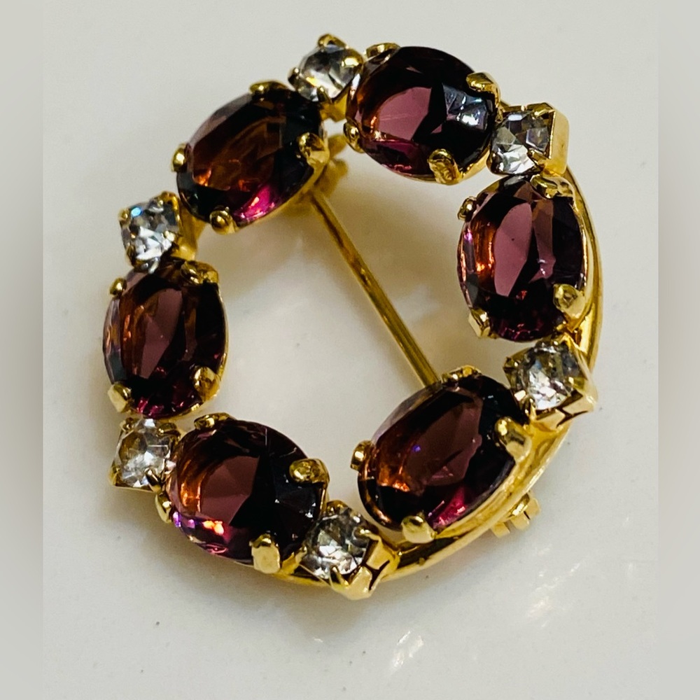 Elegant Gold and Amethyst Brooch